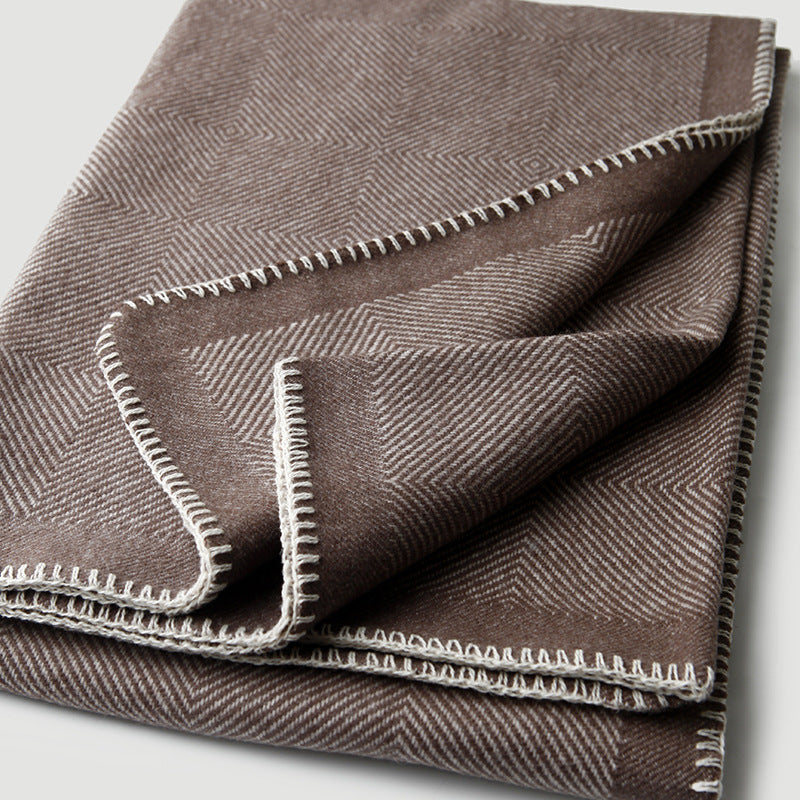 Blanket-stitch edge herringbone wool throw