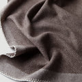 Blanket-stitch edge herringbone wool throw