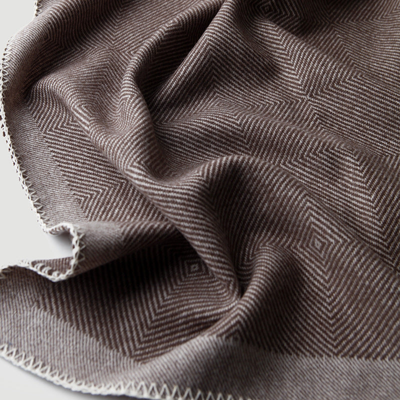Blanket-stitch edge herringbone wool throw