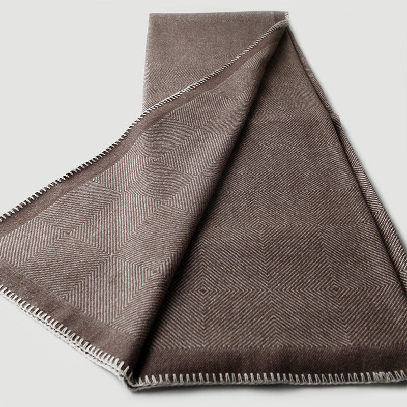 Blanket-stitch edge herringbone wool throw