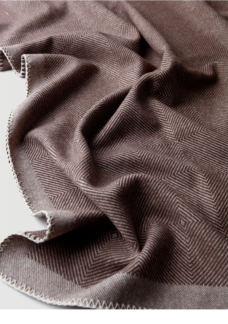 Blanket-stitch edge herringbone wool throw